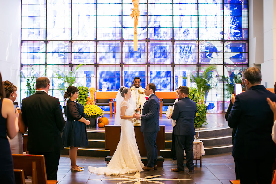 Bride and Groom at Altar on Wedding Day | St. Petersburg Wedding Venue St. Paul's Catholic Church | Wedding Photographer Limelight Photography