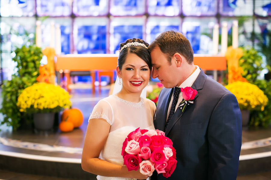 Bride and Groom Wedding Portrait with Blush and Bright Pink Rose Wedding Bouquet | St. Petersburg Wedding Venue St. Paul's Catholic Church | Wedding Photographer Limelight Photography