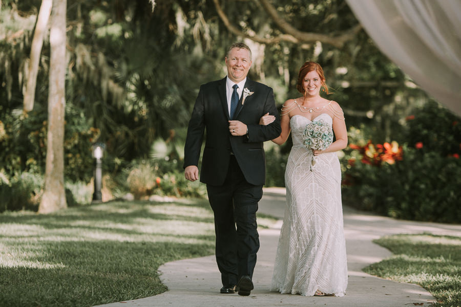 Bride and Father Walking Down the Ceremony Aisle Wedding Portrait | Sarasota Wedding Photographer Brandi Image Photography