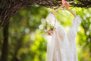 Ivory Sweetheart Lace Martina Liana Wedding Dress with Cap Sleeves on Custom Wedding Hanger
