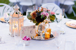 Eclectic, Vintage Shabby Chic Centerpieces with Bohemian Floral Arrangement and Tea Light Candles with Vintage Postcards