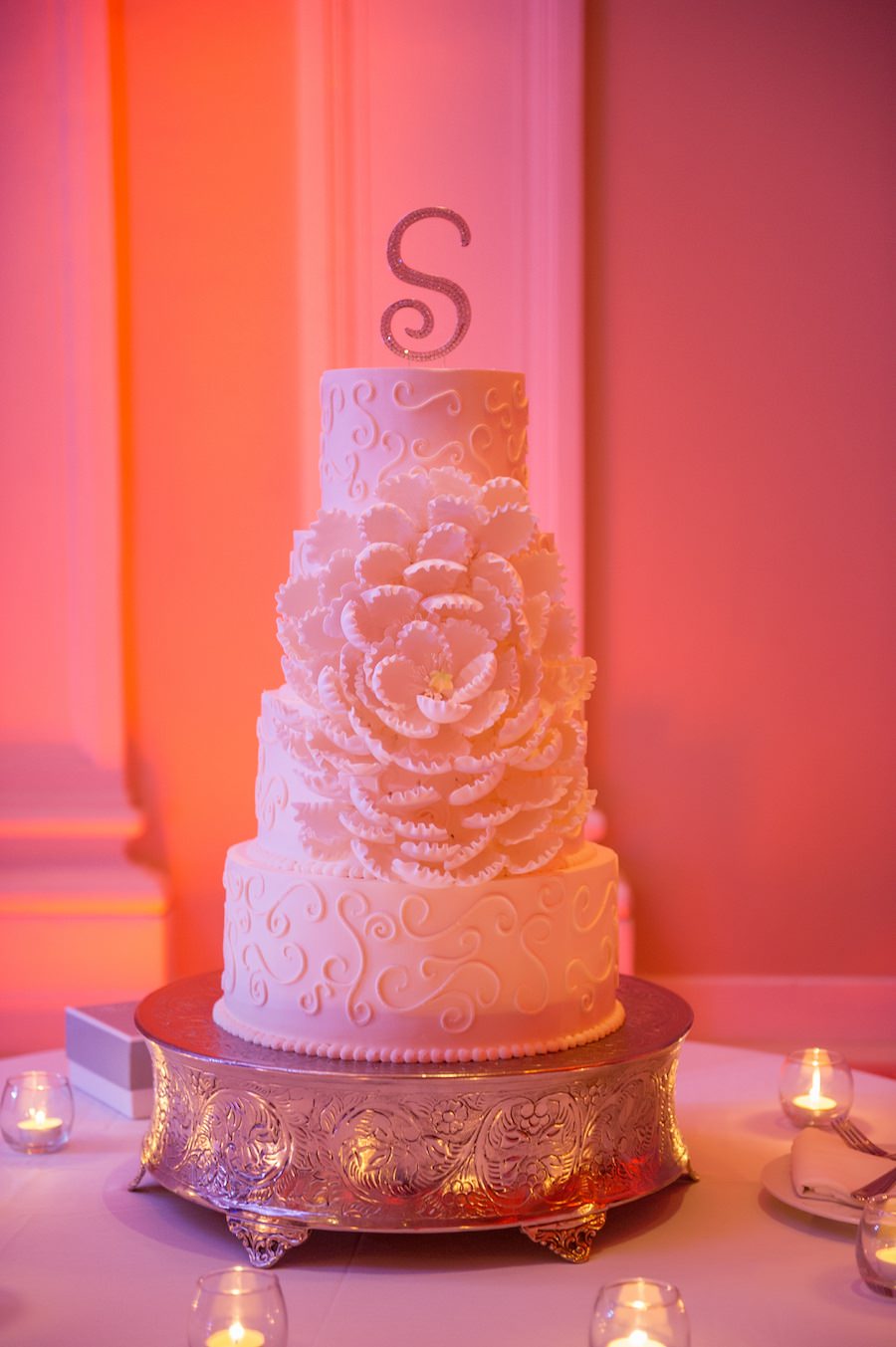 Four Tiered Round White Wedding Cake with Custom Lace Pattern and Blooming Sugar Flower with Sparkle Cake Topper