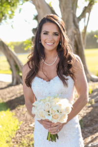 St. Petersburg Bridal Wedding Portrait in Ivory, Strapless, Beaded Wedding Dress and Ivory Floral Bouquet of Roses