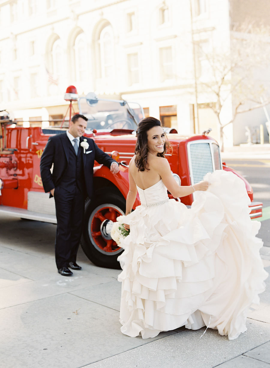 Bride and Groom Wedding Portrait in Ivory Strapless Sweetheart Ballgown with Vintage Firetruck | Downtown Tampa Wedding Planner Blush by Brandee Gaar