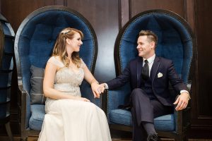 Art Deco Theme Bride and Groom Wedding Portrait in Navy Blue Suit and Ivory Beaded Jenny Packham Wedding Dress