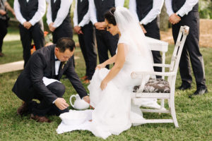 Bride and Groom Foot Washing Ceremonial Tradition at Wedding Ceremony