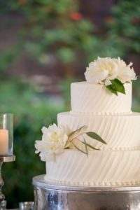 Three Tiered, Ivory, Round Wedding Cake with White Peony Accent Flowers