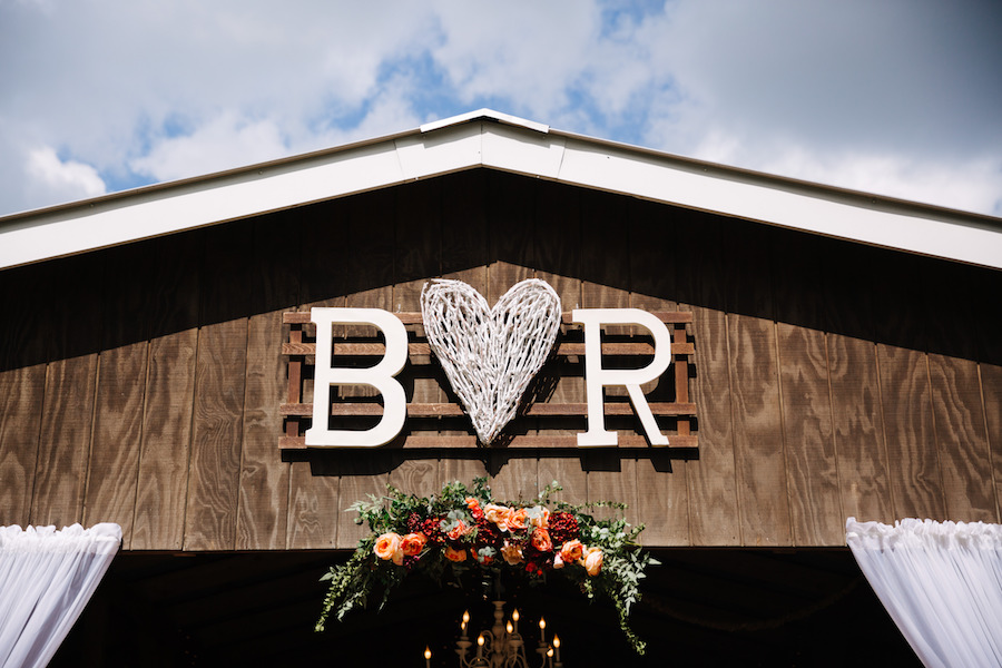 Wooden Bride and Groom Initials at Rustic, Tampa Bay Barn Wedding Reception Venue Cross Creek Ranch