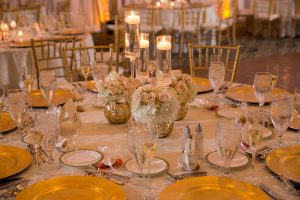 Elegant, Classic Traditional Gold and Ivory Wedding Reception Ideas and Inspiration with Low Ivory Hydrangea Candle Centerpieces and Gold Chiavari Chairs and Chargers | Downtown Tampa Wedding Venue The Floridian Palace | Tampa Wedding Planner by Blush by Brandee Gaar