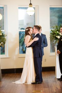 Tampa Bride and Groom Wedding Ceremony Portrait in Navy Blue Suit and Ivory Beaded Jenny Packham Wedding Dress