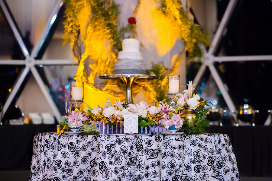 Alice in Wonderland Themed Whimsical Fairytale Wedding Reception Decor Cake Table with Grey and White Cake and Black and White Rose Linens | St. Petersburg Wedding Planner UNIQUE Weddings & Events