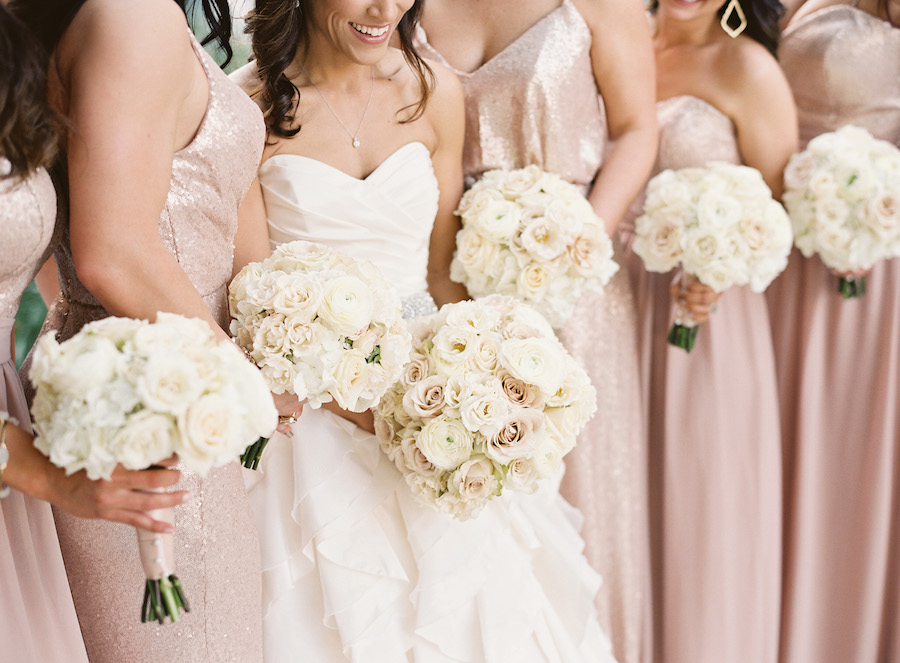 Bridal Party Wedding Portrait in Sequined Bari Jay Bridesmaids Dresses and Ivory, Strapless Bridal Ballgown with Ivory and Blush Roses and Ranunculus Wedding Bouquets
