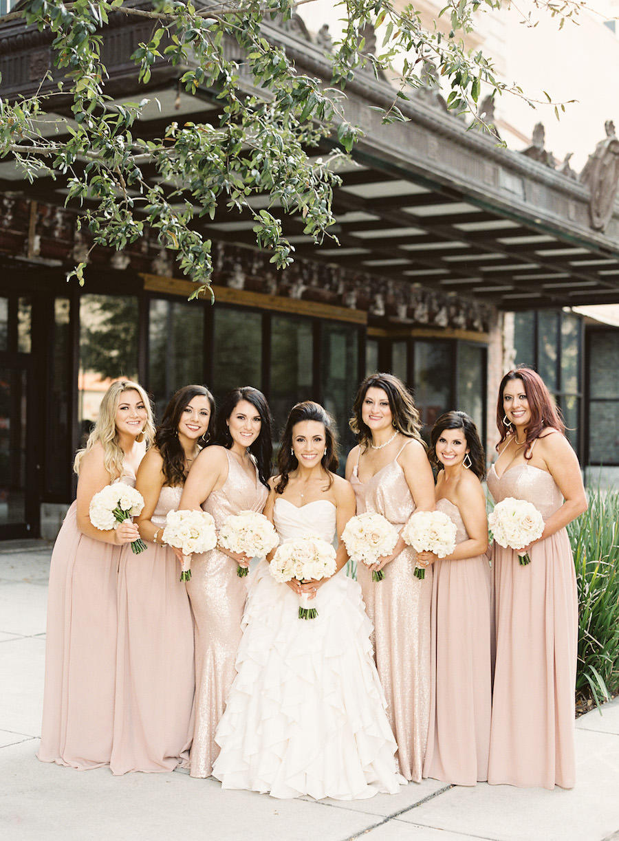 Bridal Party Wedding Portrait in Sequined Bari Jay Bridesmaids Dresses and Ivory, Strapless Bridal Ballgown with Ivory and Blush Roses and Ranunculus Wedding Bouquets
