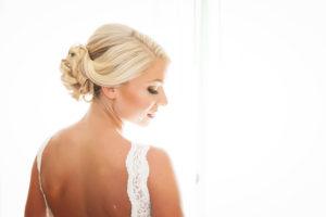 Bridal Wedding Portrait in Ivory Mikaella Backless Wedding Dress with Classic Low Chignon Updo | St. Petersburg Wedding Photographer Limelight Photography