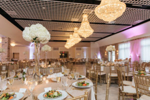 Elegant Sarasota Ballroom Wedding with Gold Chiavari Chairs, Tall White Centerpieces and Chandeliers | Wedding Event VenueThe Devyn | Planner Jennifer Matteo Event Planning