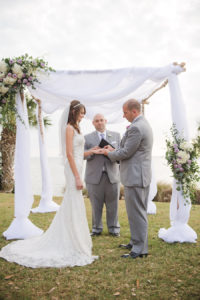 Outdoor, Sarasota Waterfront Lawn Wedding Ceremony Ring Exchange at Private Mansion Powel Crosley Estate | Sarasota Wedding Photographer Marc Edwards Photographs | Wedding Planner UNIQUE Weddings and Events