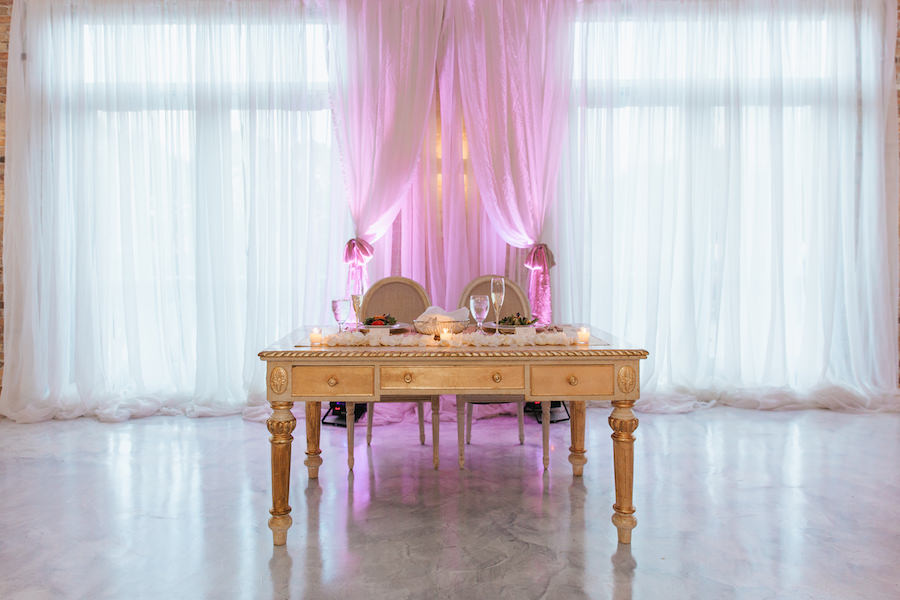 Gold Vintage Desk Table Sweetheart Table Ideas with Draping and Purple Uplighting | Ballroom Wedding Reception | Sarasota Wedding Planner Jennifer Matteo Event Planning