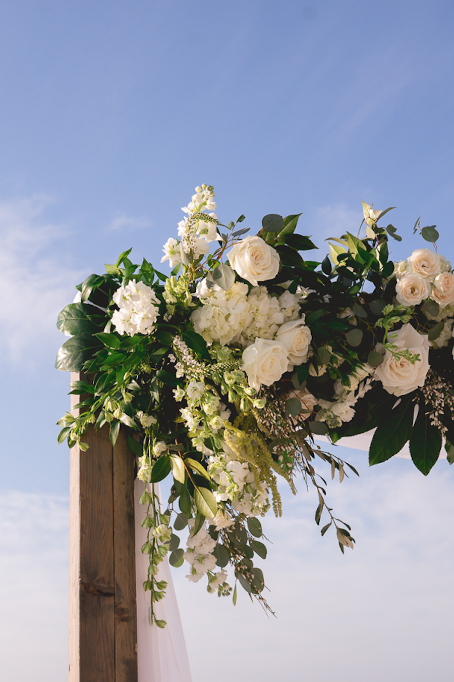 Outdoor Florida Wedding Ceremony Arch Floral Decor with Ivory Roses, Hydrangeas and Greenery