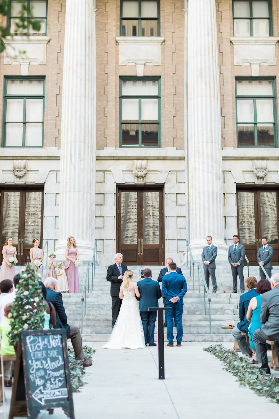 Bride and Groom Walking Down the Aisle Wedding Portrait | Downtown Tampa Wedding Planning Inspire Weddings and Events
