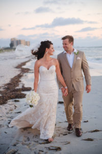 Waterfront Clearwater Beach Bride and Groom Walking on Beach Sunset Wedding Portrait | Wedding Photographer Marc Edwards Photographs