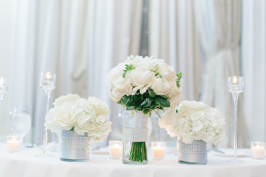 White Hydrangea and Rose Wedding Centerpiece Flowers in Silver Rhinestone Vases | St. Petersburg Wedding Planner NK Productions