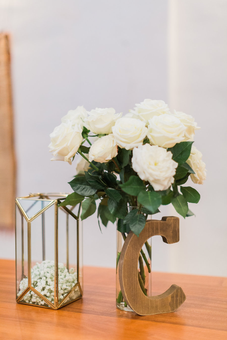 Rustic Wedding Reception Decor with Wooden Monogram Initial and Ivory Roses