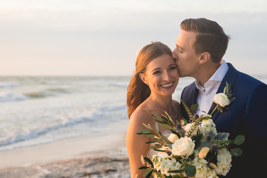 Outdoor, Florida Beach Waterfront Bride and Groom Wedding Portrait with Ivory and Greenery Wedding Bouquet | St. Petersburg Wedding Photographer Grind and Press Photography