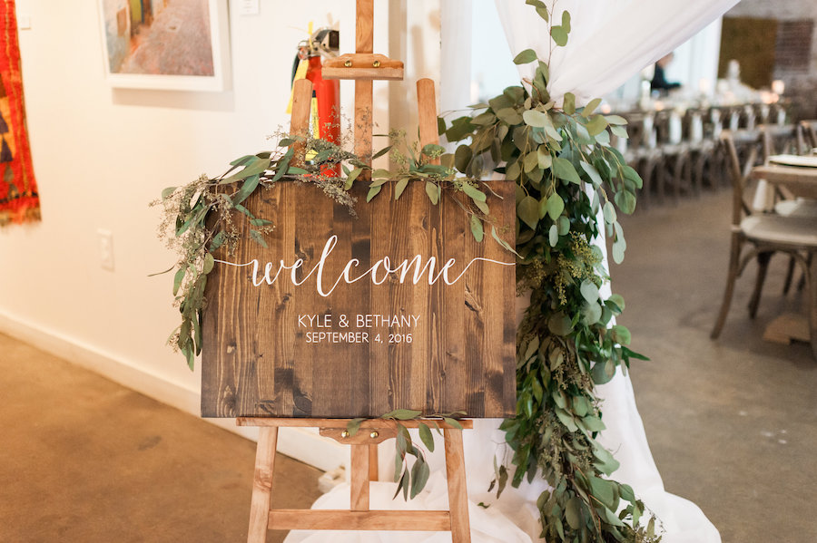 Rustic Wooden Wedding Day Welcome Sign Easel with Eucalyptus Leaves | Tampa Wedding Planning by Inspire Weddings and Events