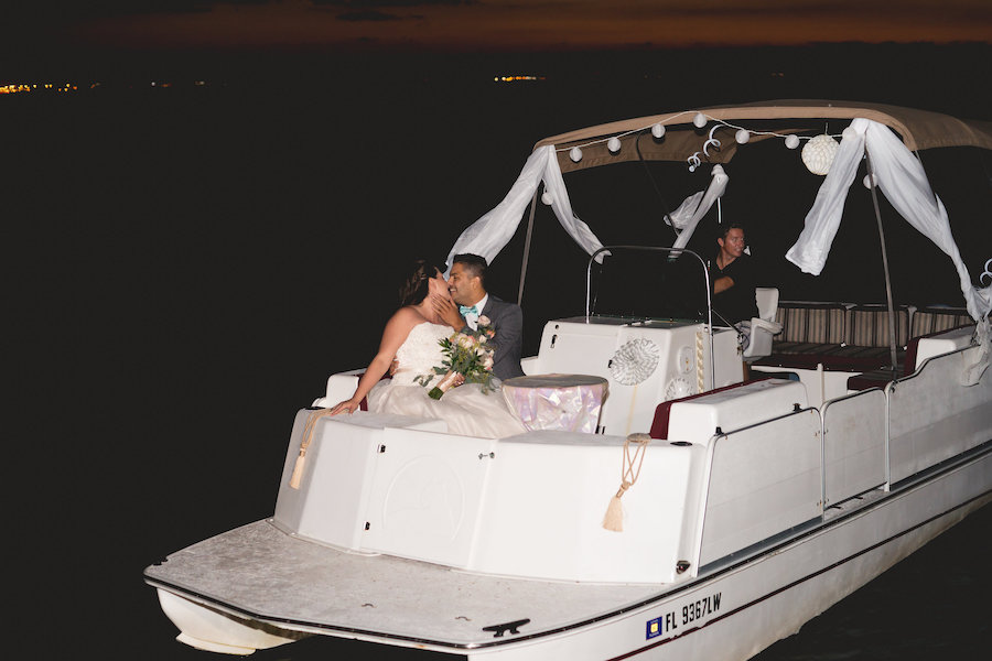 Waterfront Tampa Bay Wedding Exit on Boat | Tampa Bay Wedding Photographer Grind and Press Photography