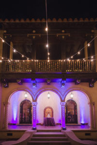 Outdoor, Evening Sarasota Wedding with Purple Uplighting and Twinkle String Lights at Sarasota Wedding Venue Powel Crosley Estate | Photography by Marc Edwards Photographs