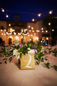 Ivory and Purple Flowers with Greenery Centerpieces and Rustic Table Number | Tampa Bay Wedding Photographer Limelight Photography | Tampa Bay Wedding Planner NK Productions