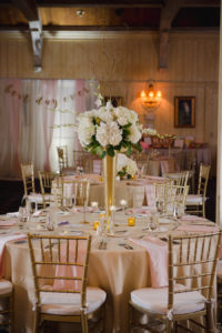 White Flowers in Tall Gold Vase Wedding Centerpiece with Gold Chiavari and Blush Pink Linens Chairs | Clearwater Beach Wedding Reception Venue Carlouel Yacht Club