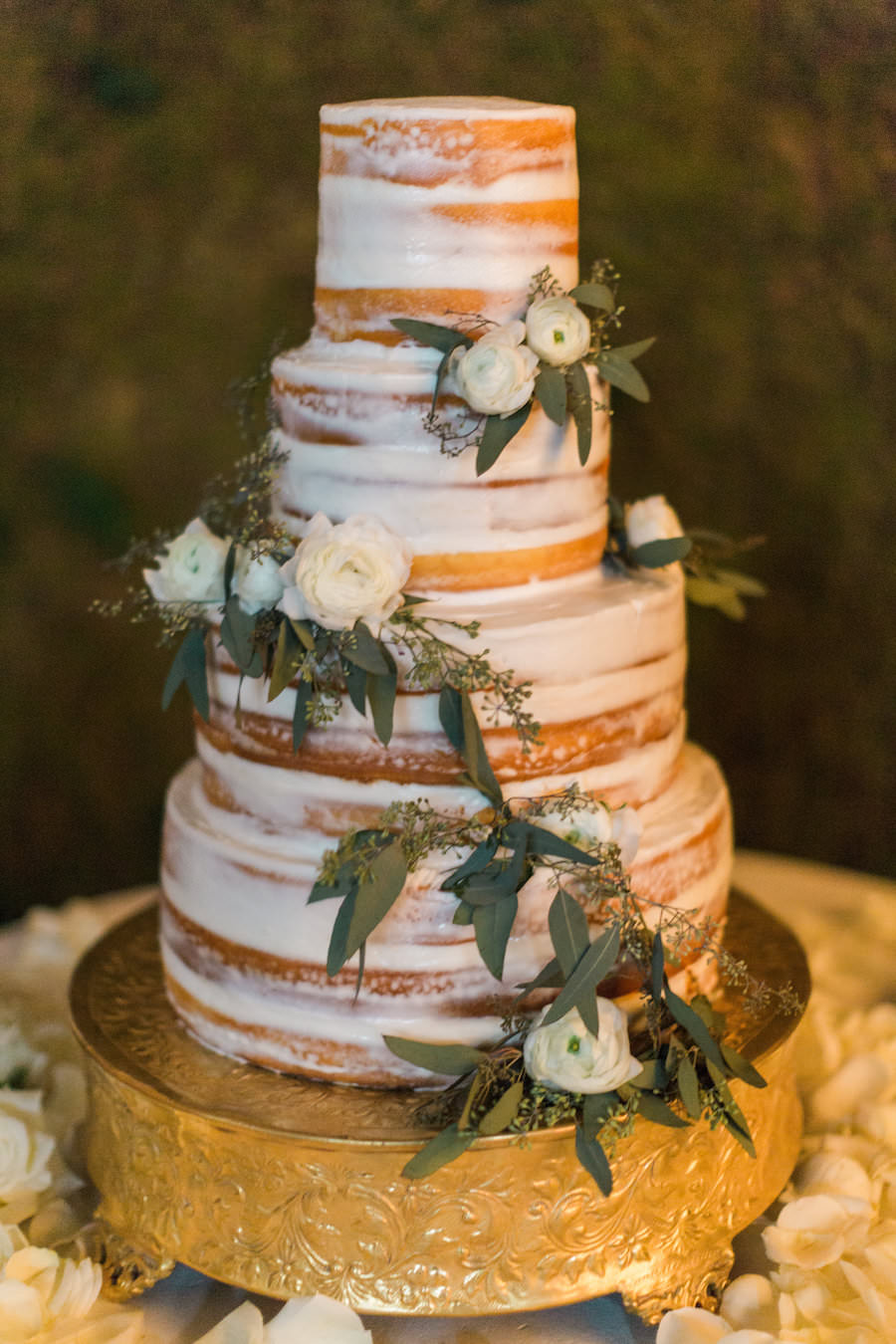 Round Four Tier Naked Wedding Cake with Fresh Ivory Roses and Eucalyptus Leaves on Gold Cake Stand | Tampa Wedding Cake by Olympia Catering