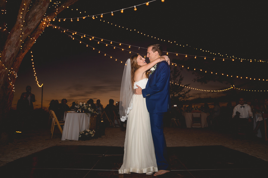 Florida Outdoor, Waterfront Bride and Groom First Dance on Treasure Island | St. Petersburg Wedding Photographer Grind and Press Photography | St Petersburg Wedding Planner Special Moments Event Planning | Cafe Lighting by Nature Coast Event Services