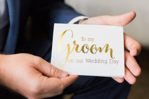 White and gold wedding card to groom