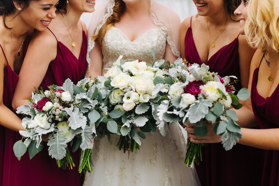 Bridesmaids in Burgundy Hayley Paige and Bride in Ivory Beaded Sweetheart Sophia Tolli with Ivory, Burgundy and GreeneryBouquet Wedding Portrait | Tampa Bay Wedding Photographer Jake & Katie Photography