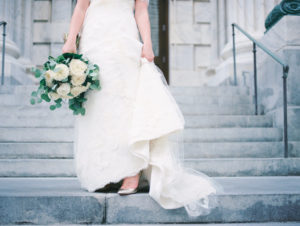 Ivory Lace Morilee Madeline Gardner Wedding Dress with Gold Shoes and Bouquet with Eucalyptus Leaves and Ivory Peonies