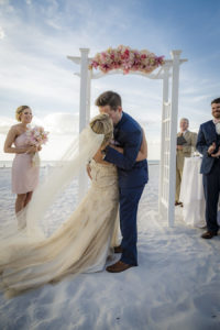 Outdoor, Tampa Bay Beach Waterfront Bride and Groom First Kiss Wedding Portrait | | Outdoor Waterfront Hotel Wedding Venue Hilton Clearwater Beach