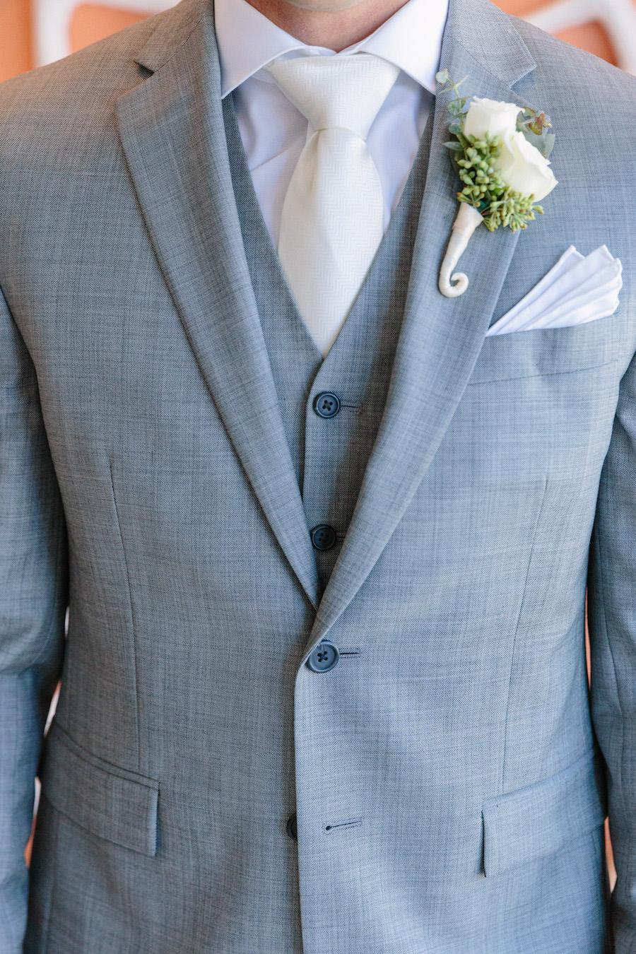 Groom Wedding Portrait in Light Grey Suit and Ivory Tie with Ivory Floral Boutonniere