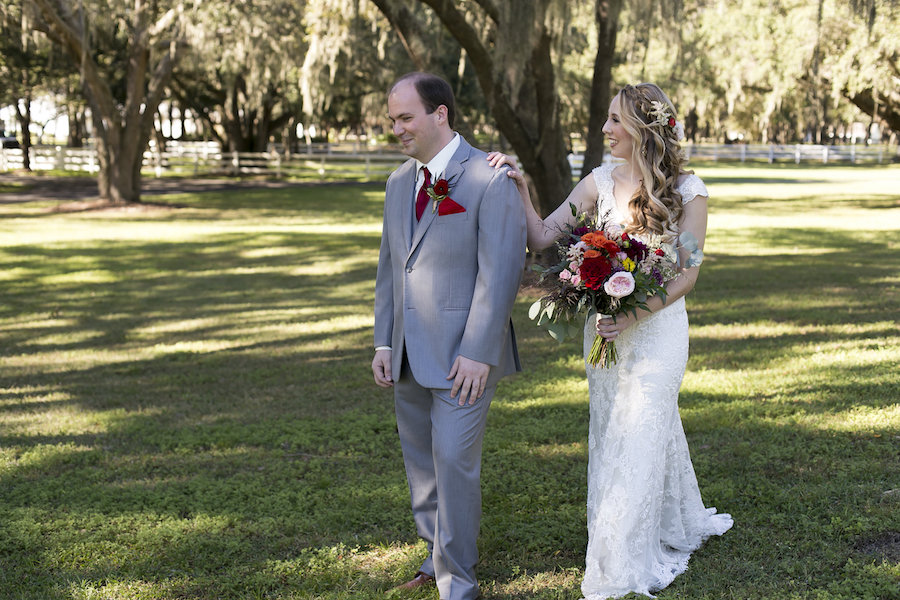 Bride and Groom First Look Wedding Portrait at Rustic Outdoor Tampa Bay Wedding Venue The Lange Farm