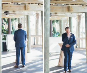Groom in navy suit | Wedding Day first look portrait reaction