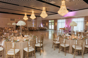 Elegant Sarasota Ballroom Wedding with Gold Chiavari Chairs, Tall White Centerpieces and Chandeliers | Wedding Event VenueThe Devyn | Planner Jennifer Matteo Event Planning
