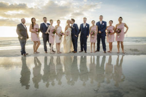 Outdoor, Tampa Bay Waterfront Bridal Party Wedding Portrait with Bridesmaids in Blush Pink One Shoulder Wedding Dresses | Outdoor Waterfront Hotel Wedding Venue Hilton Clearwater Beach
