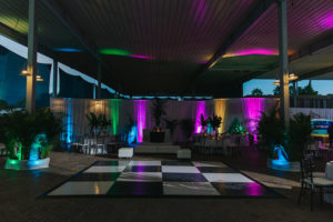 Black and White Dance Floor with Multi-Color Up Lighting | Sarasota Wedding Reception Venue Mote Marine Labaratory and Aquarium | Sarasota Wedding Planner Jennifer Matteo Event Planning