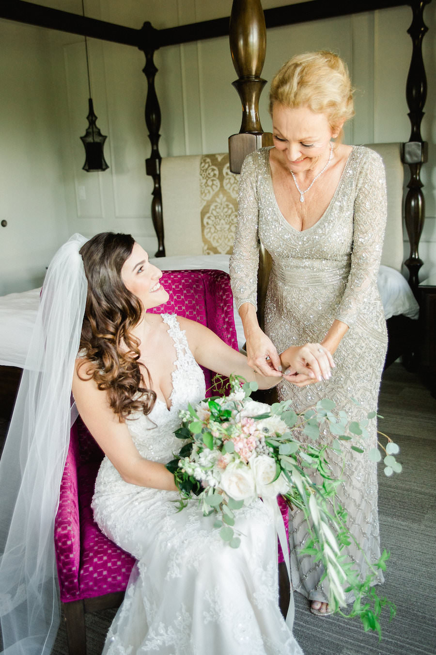 Bride Getting Ready on Wedding Day | Mom Helping Bride Put on Bracelet | St. Petersburg Wedding Venue The Birchwood | Tampa Bay Wedding Photographer Ailyn La Torre Photography