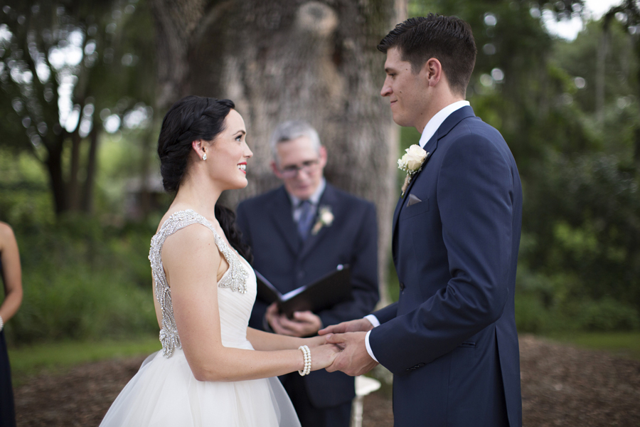 Outdoor Wedding Ceremony Bride and Groom Holding Hands | Tampa Bay Wedding Venue Cross Creek Ranch | Wedding Photographer Djamel Photography
