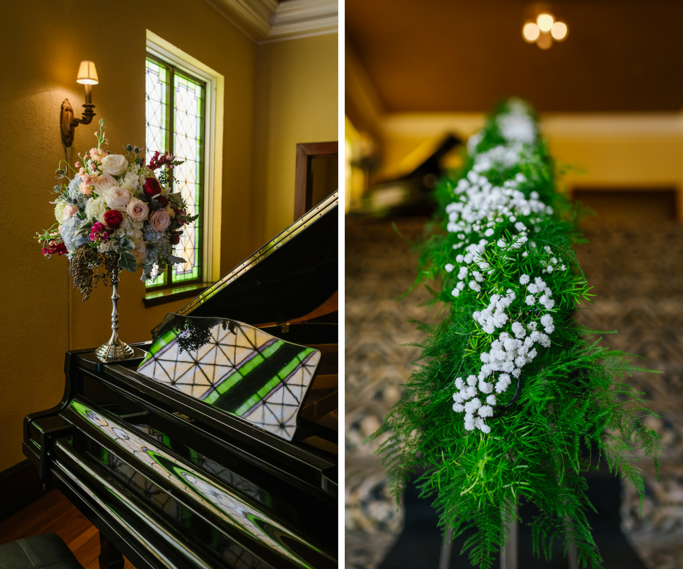 Grand Piano with Tall Ivory and Burgundy Wedding Floral Arrangement with Draping Greenery