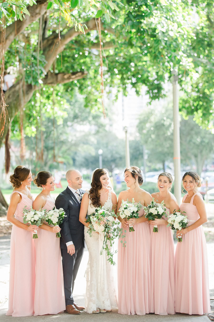 Outdoor, Downtown St. Petersburg Bridal Party with Bridesmaids in Blush Dresses Wedding Portrait | St. Petersburg Wedding Venue The Birchwood | Tampa Bay Wedding Photographer Ailyn La Torre Photography