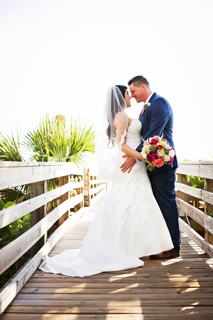 Florida Outdoor Bride and Groom Wedding Day Portrait with Pink and Green Wedding Bouquet | Sarasota Wedding Photographer Limelight Photography