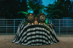 Black White Gold and Green Sweetheart Table with Pineapple and Mr. and Mrs. Sign Accents | Sarasota Wedding Planner Jennifer Matteo Event Planning
